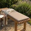 Cuscino Cosma Real 110 tortora su panca in legno