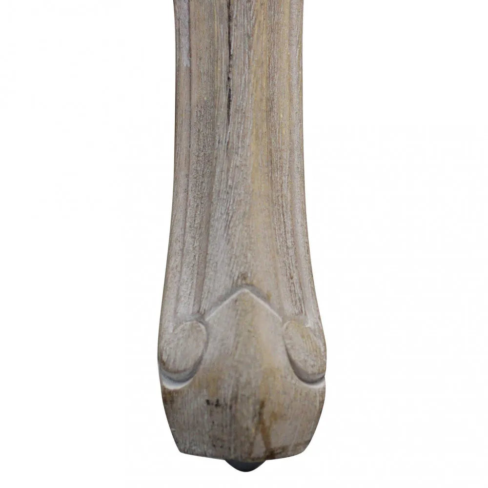 Poltrona di design Coreen in velluto grigio per salotto o studio particolare gambe legno