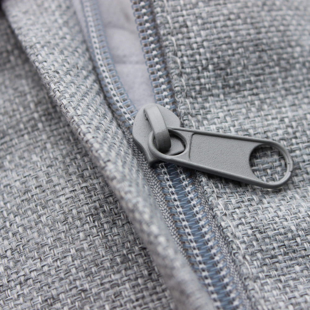 Primo piano cuscini sfoderabili del salotto Surabaya, che evidenzia la finitura e il design essenziale