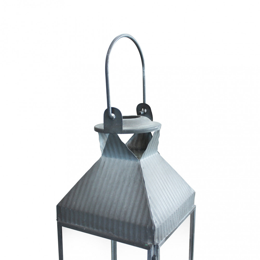 Dettaglio della finitura in metallo grigio e della struttura in vetro della Lanterna Harmony vista maniglia