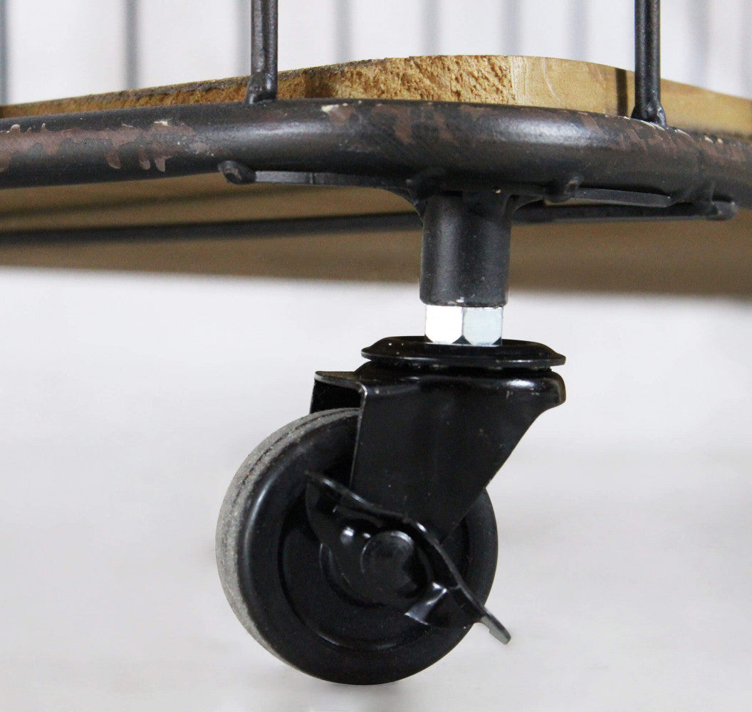 Dettaglio Ruote Libreria Alban con tre ripiani spaziosi per libri e oggetti decorativi | Albert Stock