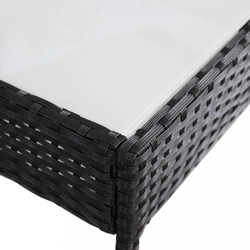 Primo piano della trama in wicker nero del salotto Caracas, che evidenzia la finitura e la lavorazione del materiale.