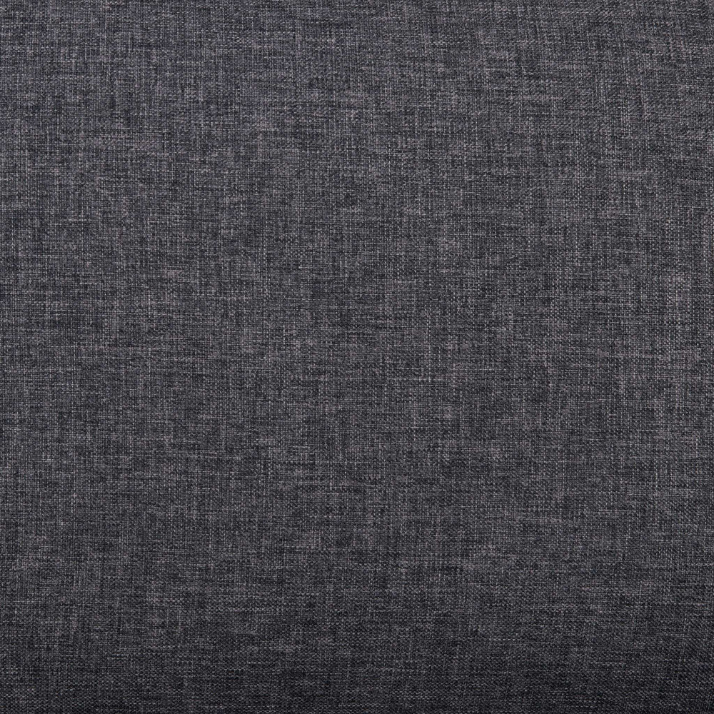 Macro sulla texture materica del tessuto premium-grade grigio scuro del divano.