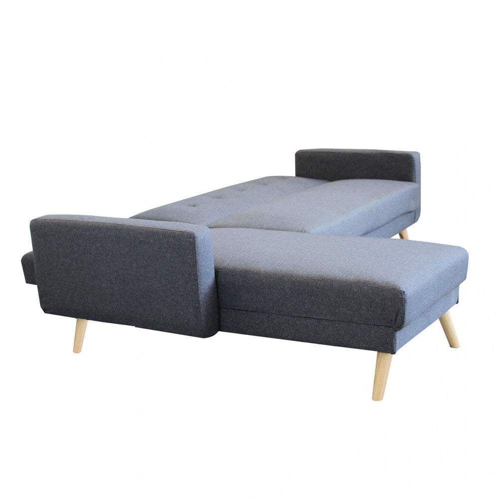 Divano letto Arthur trasformato in configurazione letto, illustrando la versatilità della struttura su sfondo bianco.