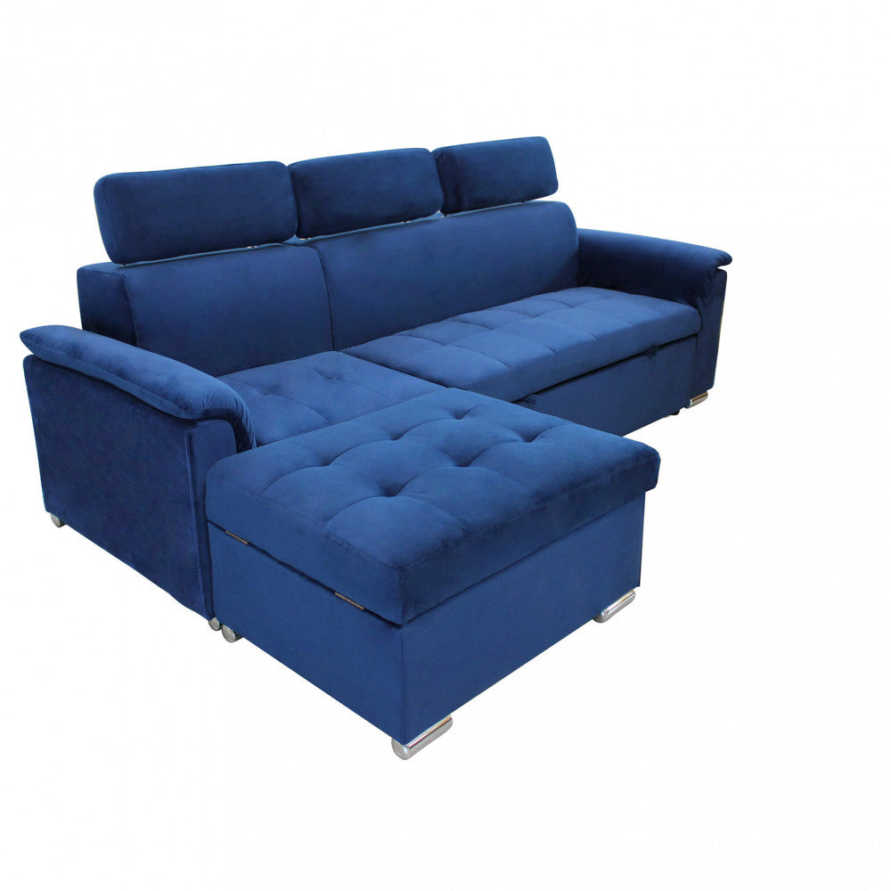 Vista angolare del divano letto blu con pouf contenitore accostato.