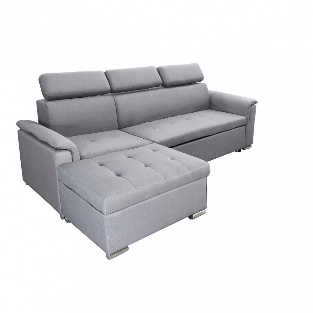 Divano letto Derrick in tessuto grigio chiaro con penisola, vista frontale su sfondo bianco.