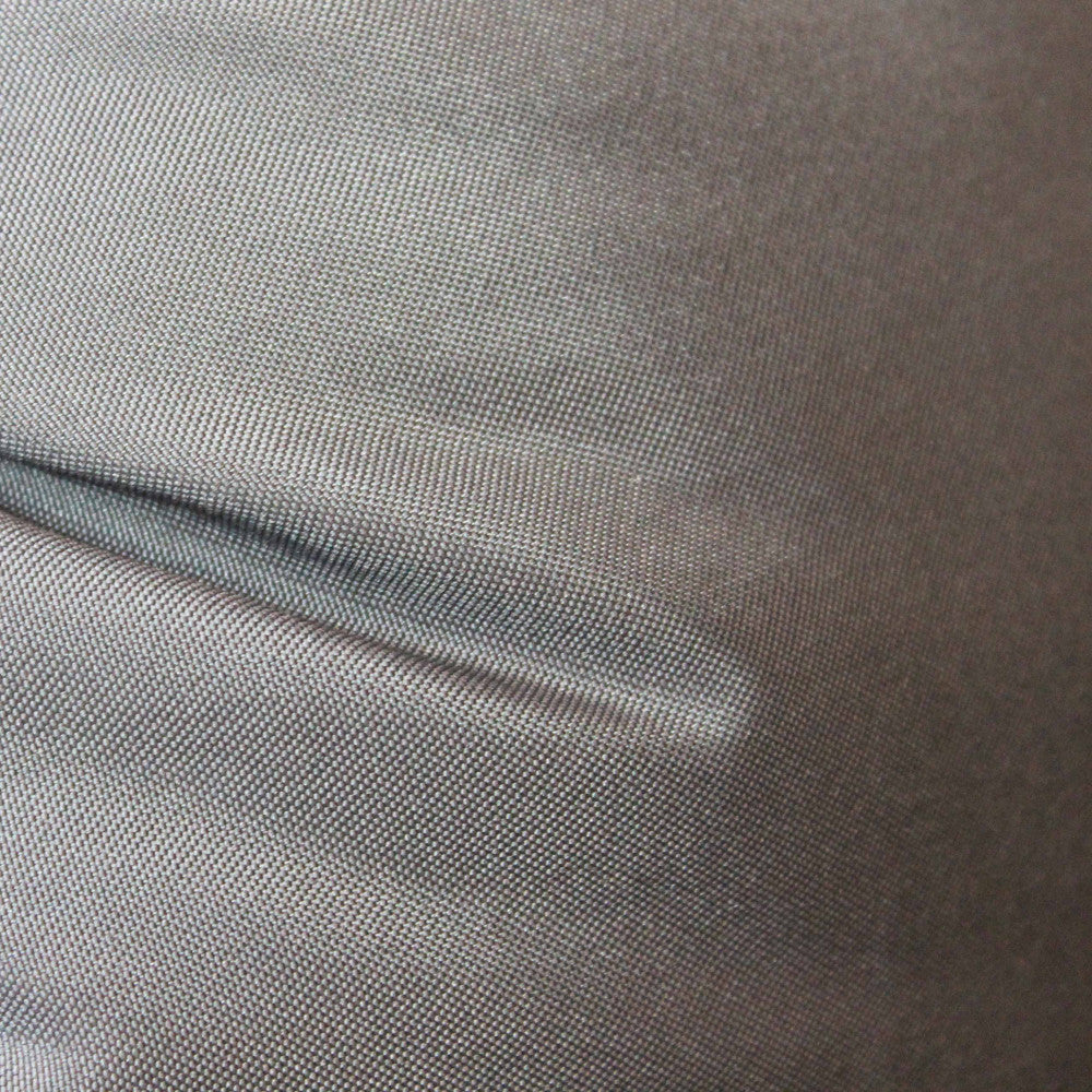Texture del tessuto grigio dei cuscini imbottiti del dondolo sospeso.