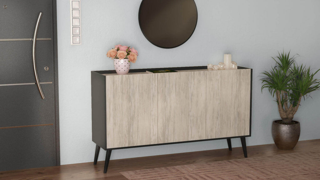 Credenza posizionata in un ingresso moderno con specchio rotondo e pianta decorativa in vaso.