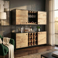 Credenza bar Arden in legno marrone inserita in un elegante salotto moderno con poltrona verde.