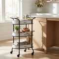 Carrello Chile in acciaio bianco a tre ripiani ambientato in una cucina luminosa con accessori da tè.
