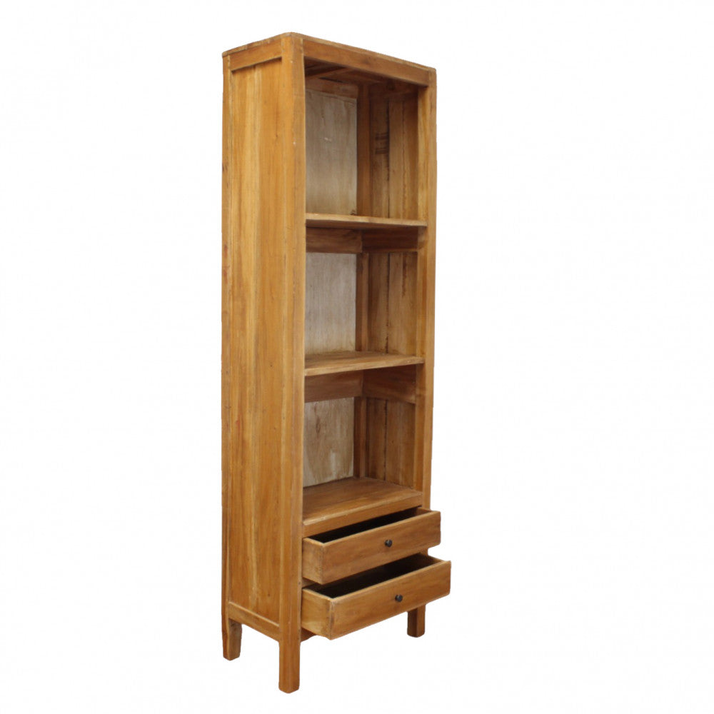 Vista angolare della libreria DEVEREUX in legno massello, con i cassetti inferiori aperti.