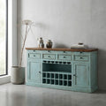 Credenza Gordon in legno di mango azzurro anticato ambientata in un living moderno e luminoso.
