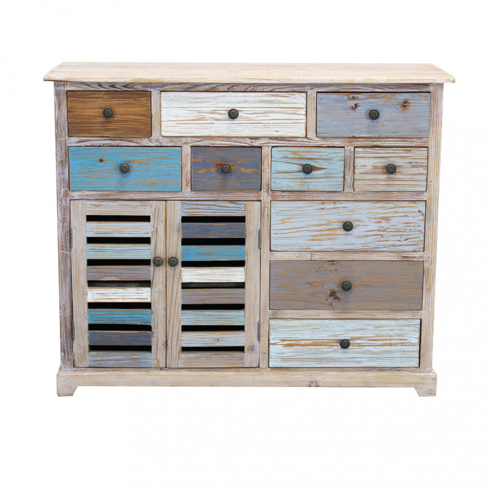 Dettaglio frontale della credenza GREG in legno massello con finitura rustica e multicolore.