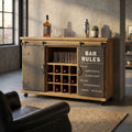 Mobile bar Edmond in legno e acciaio ambientato in un loft industriale con bottiglie e bicchieri a vista.