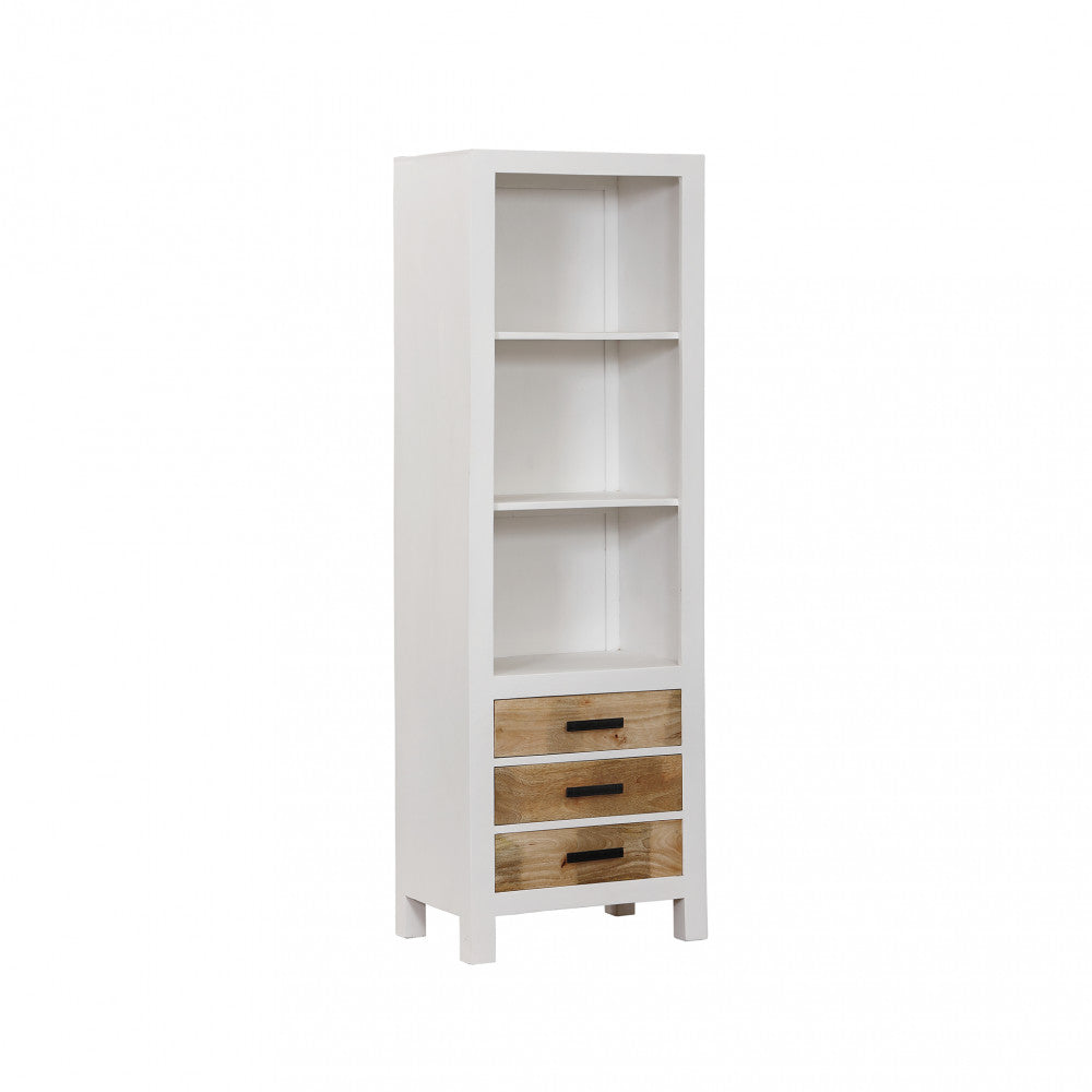 Vista angolare della libreria Jeffrey, che mostra la struttura bianca e i cassetti in legno di mango naturale.