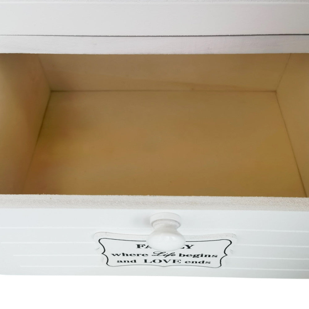 Dettaglio dell'interno del cassetto in legno naturale, che mostra la capienza e la finitura liscia.