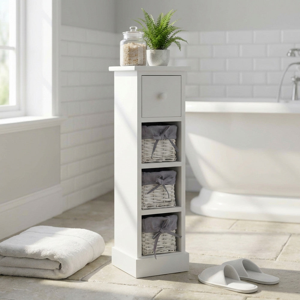 Dettaglio del mobiletto Angel con ceste in vimini e cassetto in legno in un ambiente bagno elegante.