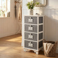 Mobiletto Beltran a 4 cassetti in stile shabby chic, ambientato in un ingresso luminoso con pavimento in legno.