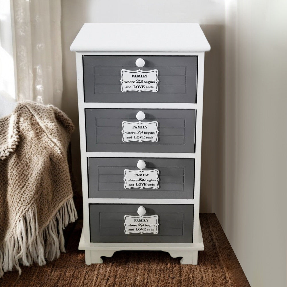 Dettaglio frontale del comodino Beltran in un ambiente accogliente con coperte in maglia e luce naturale.