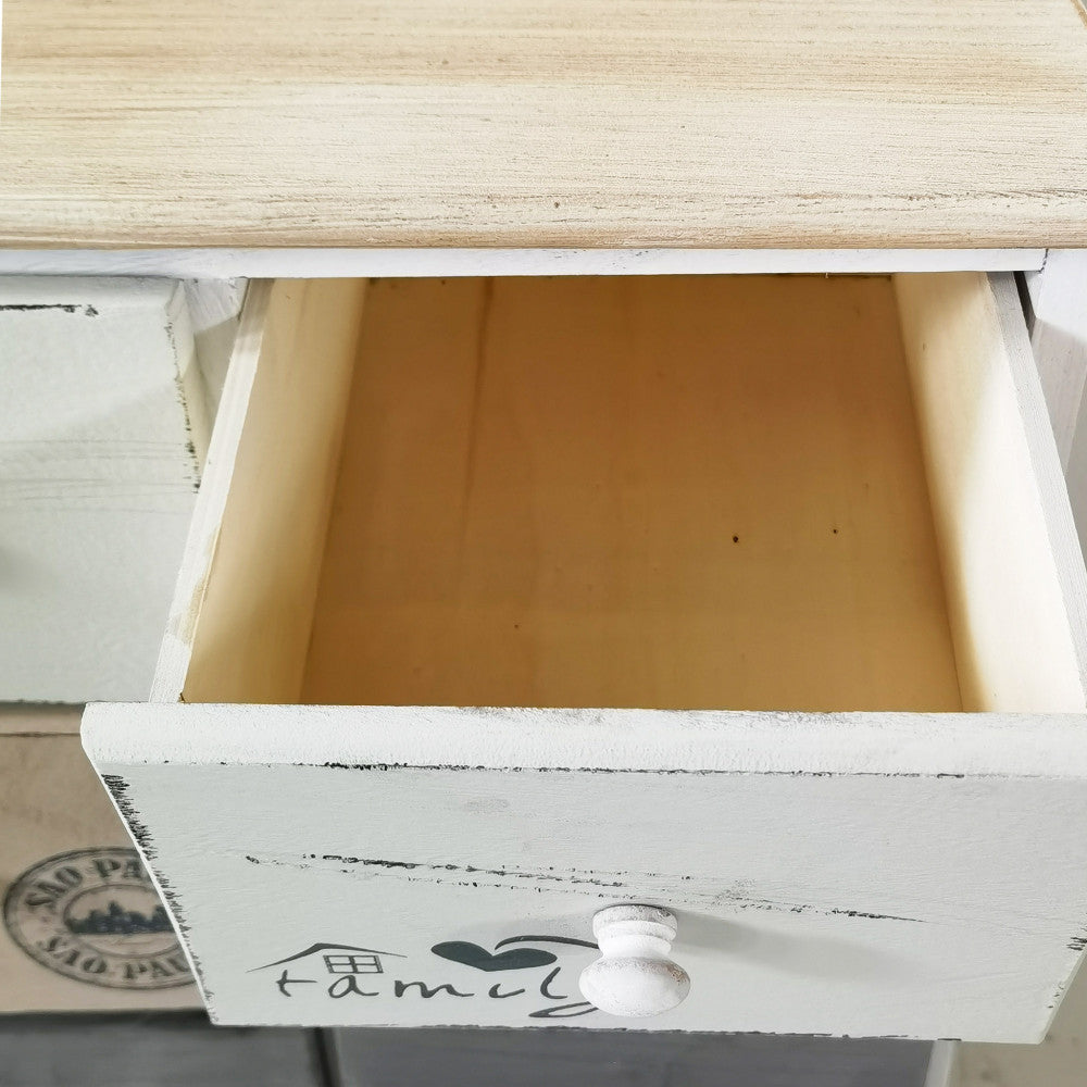 Dettaglio del cassetto aperto del mobiletto Bartolome, che mostra la capienza interna e la maniglia.