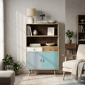 Mobiletto Barrie in legno MDF inserito in un luminoso soggiorno dal design scandinavo, decorato con libri e vasi in ceramica.