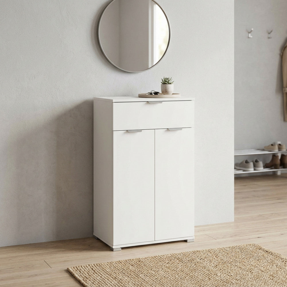 Mobiletto MR805033 in truciolare bilaminato bianco, ambientato in un ingresso moderno con specchio circolare.