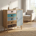 Cassettiera Levis in legno MDF multicolor ambientata in un luminoso soggiorno contemporaneo con poltrona chiara.