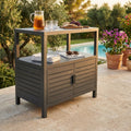 Mobiletto Phoenix in alluminio antracite allestito come stazione bar a bordo piscina.