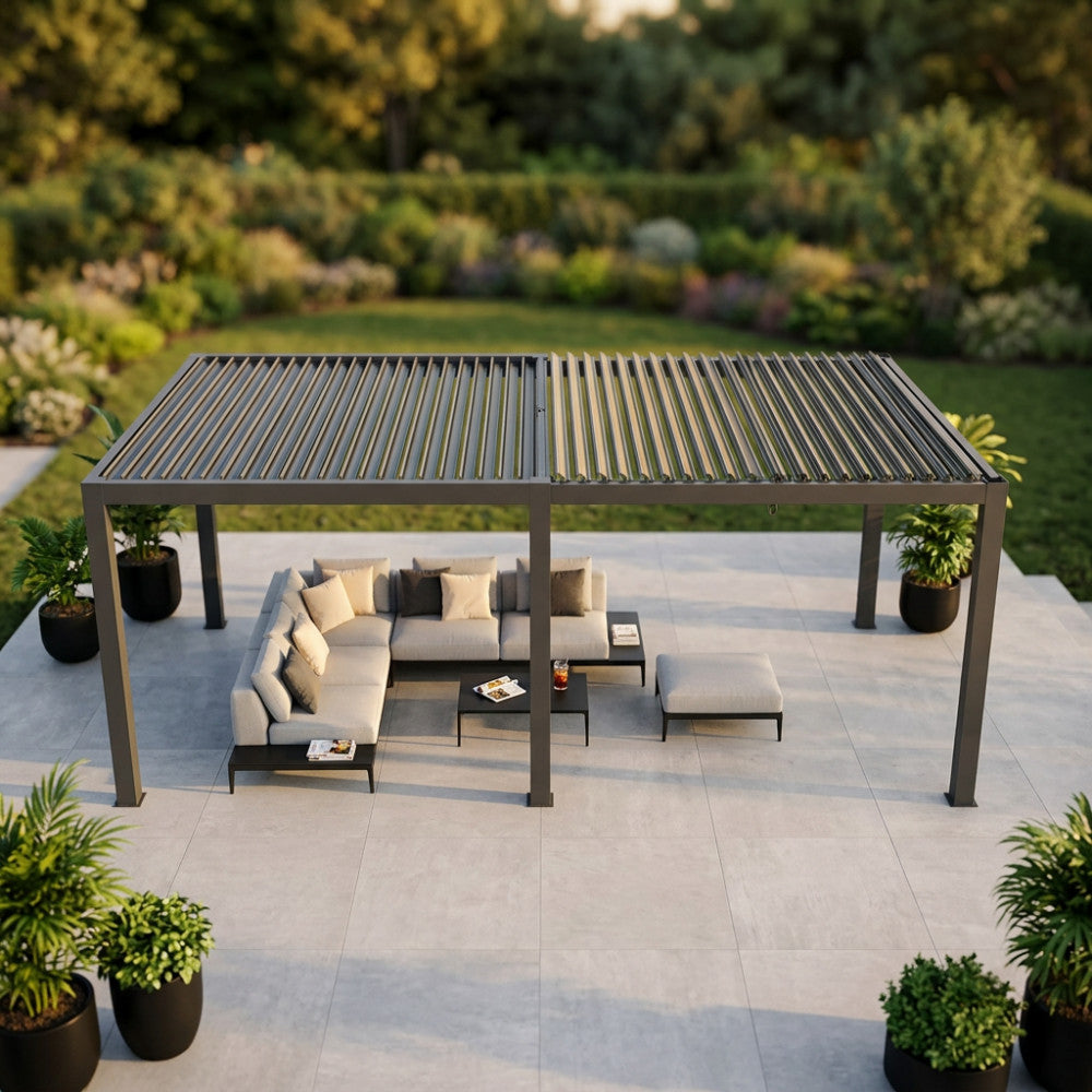 Gazebo modulo per pergola bioclimatica in alluminio antracite allestito con un elegante salotto da esterni.