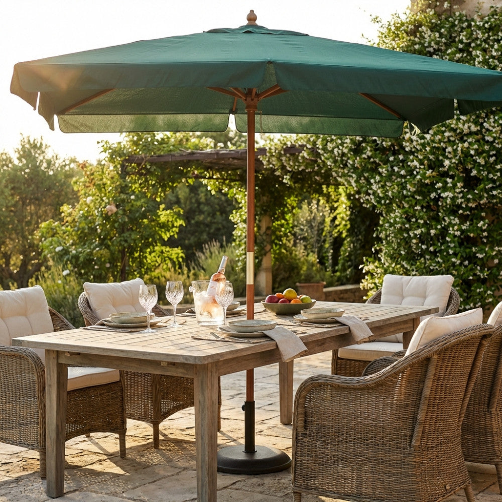 Cosma Ombrellone Fantasy 3x3 verde scuro aperto su tavolo da pranzo outdoor