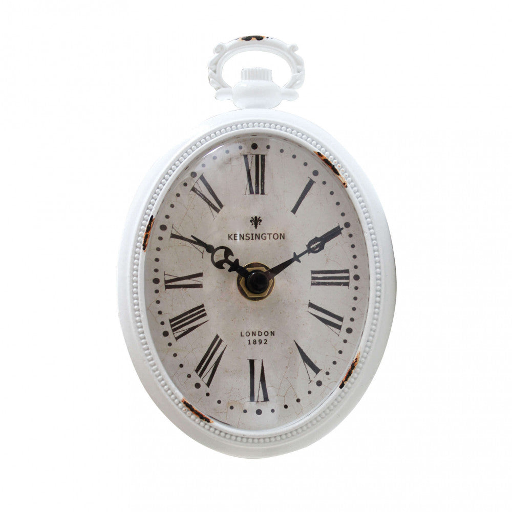 Orologio da parete Cosma stile vintage appoggiato su una mensola