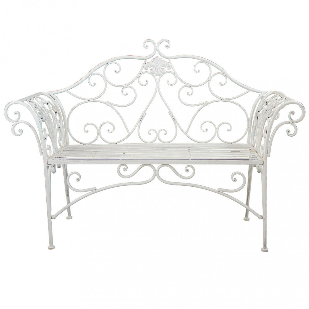 Panca Eloise in metallo verniciato a polvere colore bianco antico, posizionata in un giardino