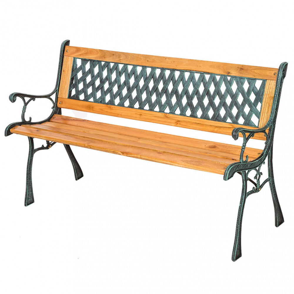 Panchina Ghisa Ginevra in legno e ghisa, posizionata in un giardino con piante.