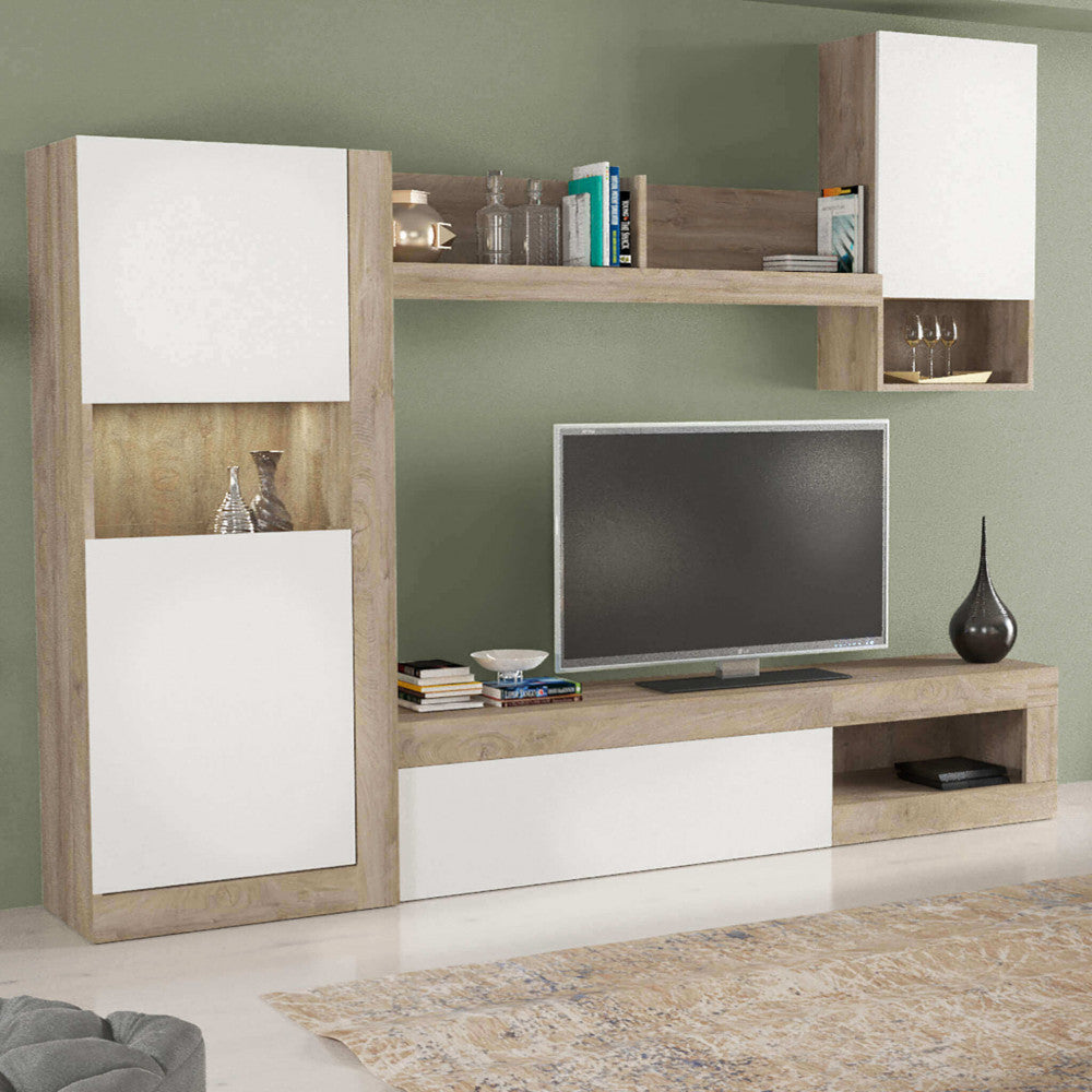 Parete attrezzata Roomy inserita in un living con parete verde salvia, creando un contrasto cromatico elegante.