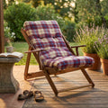 Poltrona Cosma in legno miele con cuscino tartan