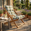 Poltrona relax Cosma in legno miele con cuscino tartan verde