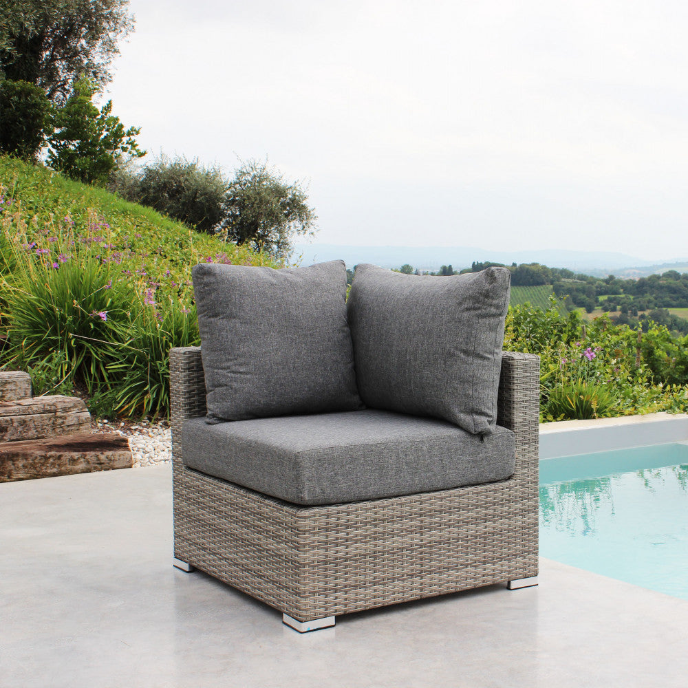 Poltrona angolare Copacabana in alluminio e wicker grigio con cuscini spessi 12 cm.