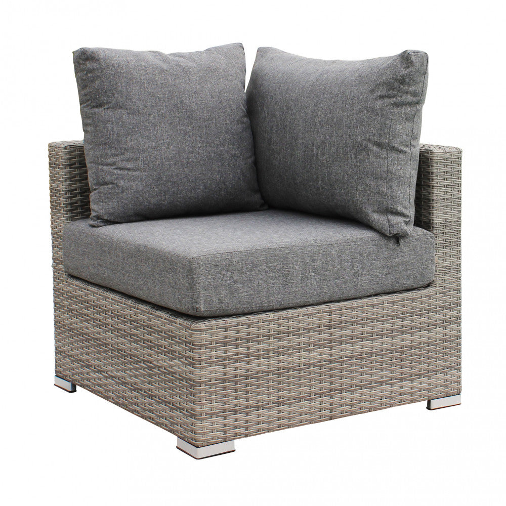 Poltrona angolare Copacabana in un set lounge esterno moderno.