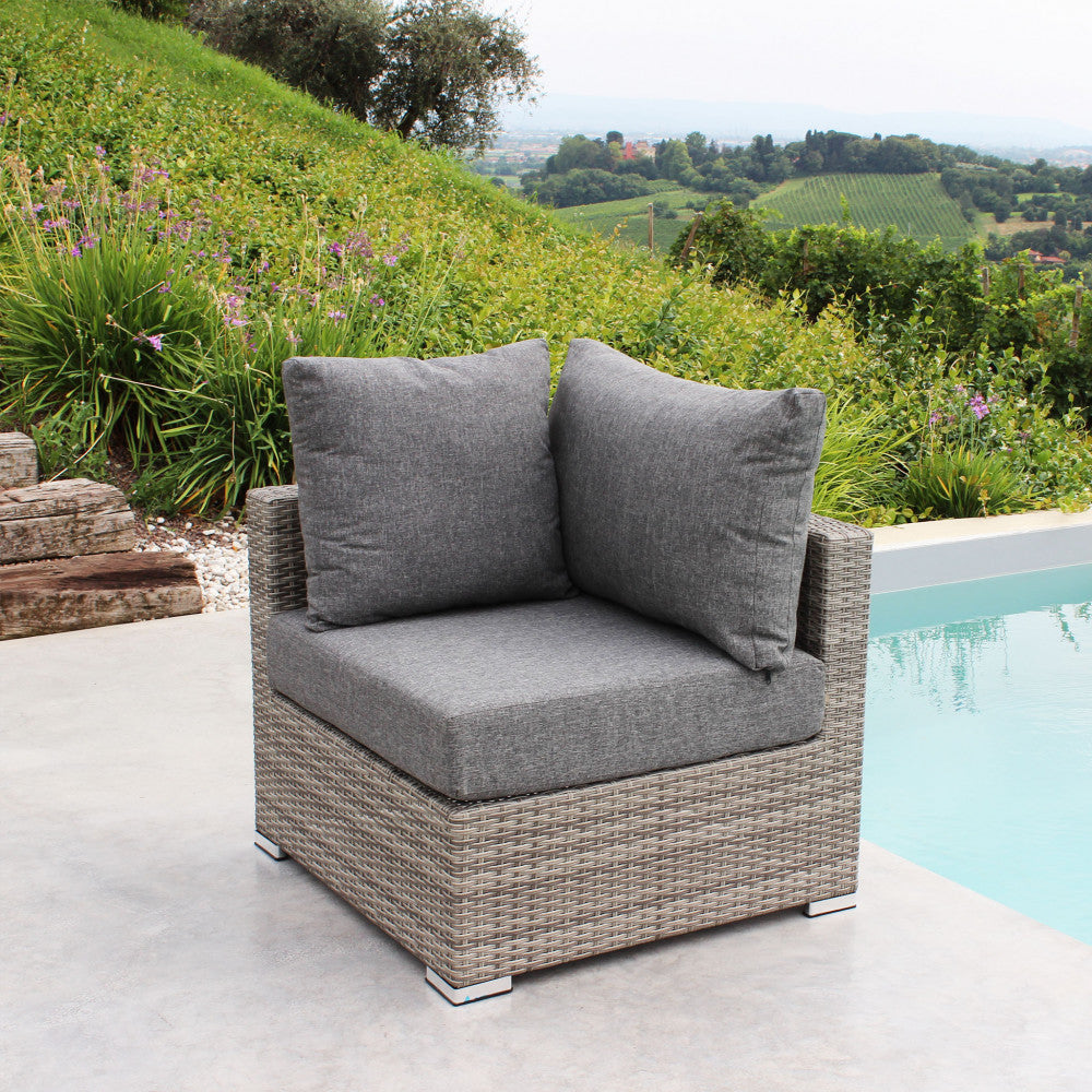 Poltrona angolare Copacabana in alluminio e wicker grigio con cuscini spessi 12 cm.