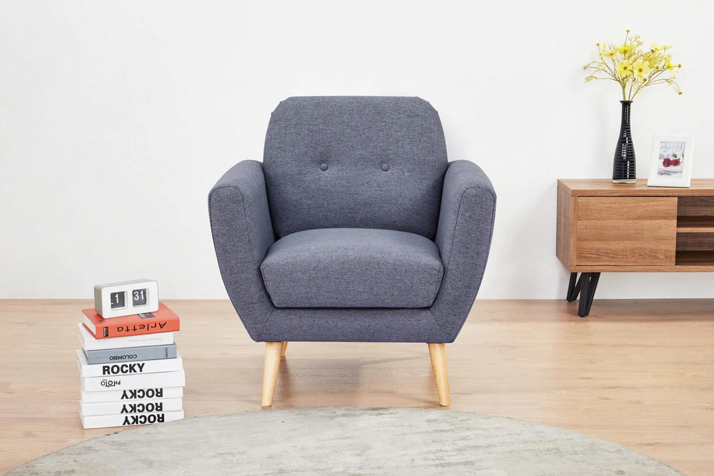 Poltrona Burton in Tessuto Grigio Scuro (84 cm) con bottoni decorativi, gambe in polipropilene, design moderno, ambientazione