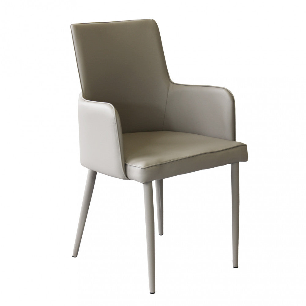 Poltrona Camille con braccioli e seduta imbottita in ecopelle color tortora, vista laterale