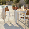 Poltrona outdoor Cosma Cayman bianca con doghe effetto teak