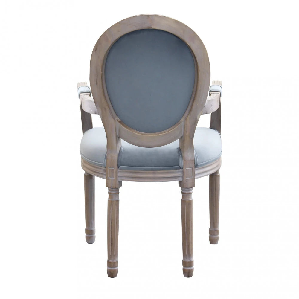 Poltrona Constance in velluto grigio con braccioli, struttura in legno vintage, design moderno vista retro