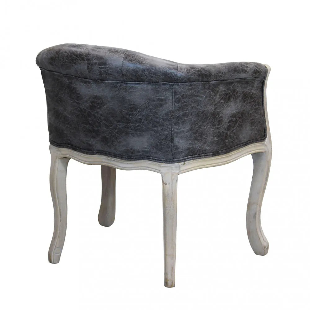 Poltrona Coreen in ecopelle grigio vintage con struttura in legno per interni vista retro