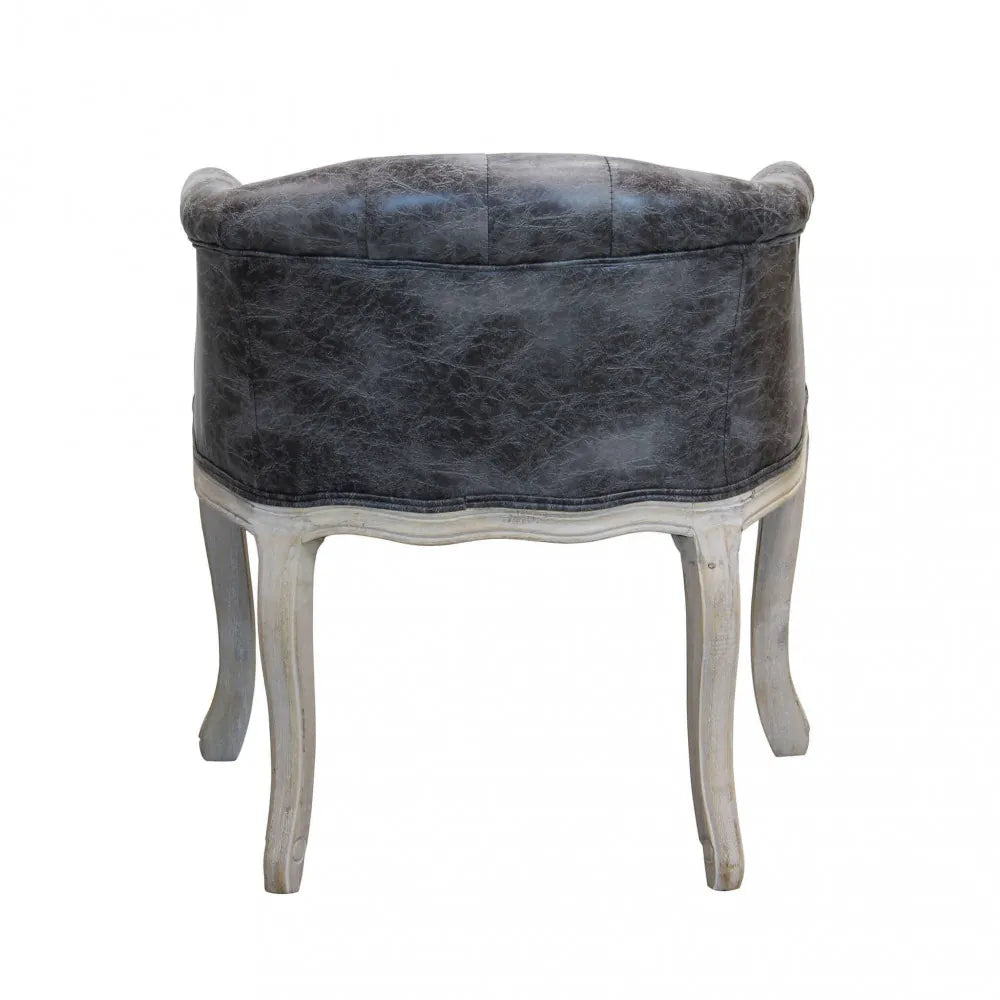 Poltrona Coreen in ecopelle grigio vintage con struttura in legno per interni vista retro