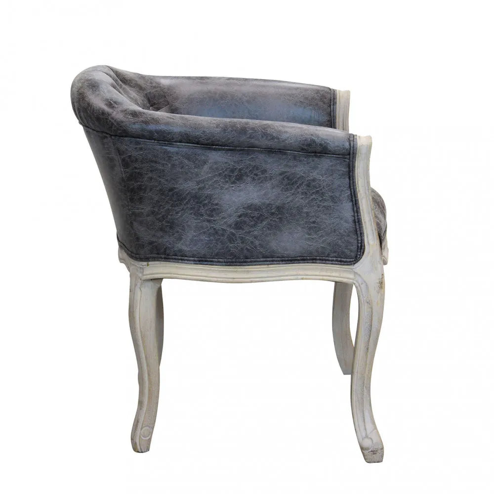 Poltrona Coreen in ecopelle grigio vintage con struttura in legno per interni vista laterale