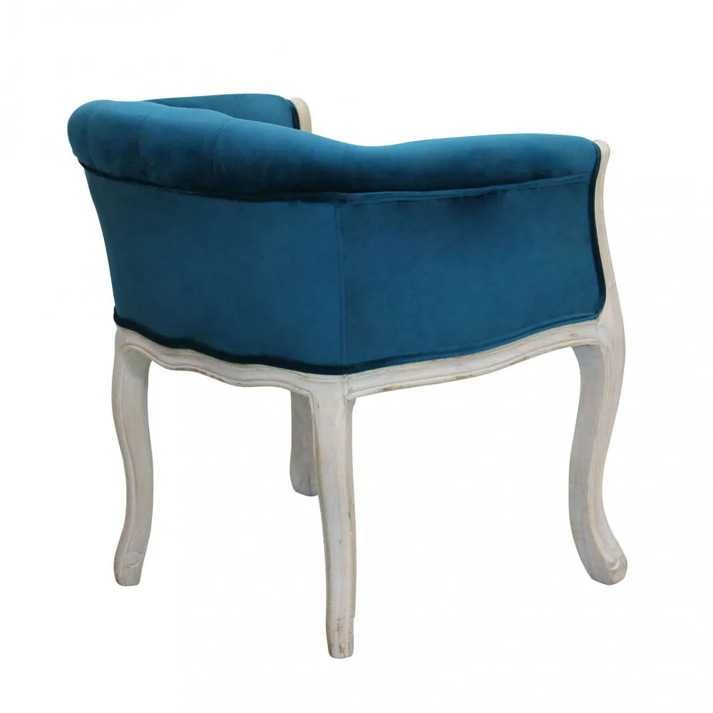 Poltrona Coreen in velluto blu con braccioli e struttura in legno 61cm profilo laterale retro