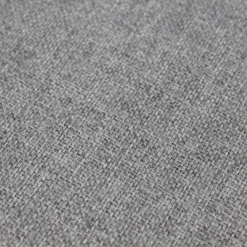 Texture del tessuto premium grigio utilizzato per la seduta della poltrona Corrientes.