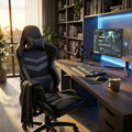 Poltrona da ufficio Fortnite in poliuretano grigio, ambientata in uno studio domestico moderno e luminoso con doppio monitor.