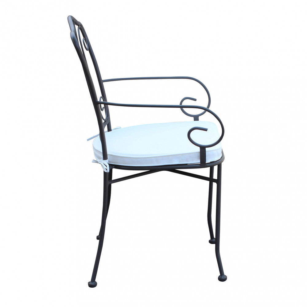 Poltrona da Esterno Demetra in ferro verniciato antracite con cuscino bianco.